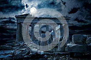 Athens at night, Greece. Fantasy view of old mysterious Parthenon temple, top landmark of Athens city