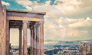 Athens view from Acropolis, Greece. Columns of Erechtheion temple overlooking Athens city. Acropolis hill is top landmark of