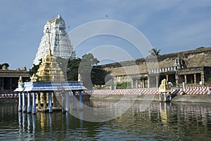 Athi varathar temple pond with gopuram photo