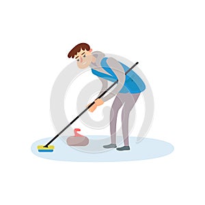 An athlete in blue clothes on the ice is rubbing the floor with a brush, thus pushing a stone.
