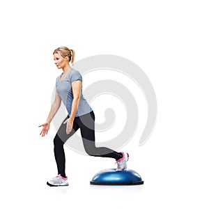 Athlete, bosu ball or legs training in workout for body or core development isolated on white background. Woman