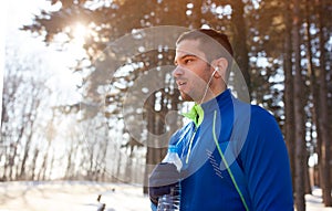 Athlete with bottle of water outdoor