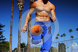 Athlete dribbling basketball