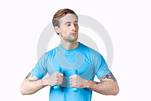 athlete with dumbbells doing exercise fitness pumped up arm muscles tattoo