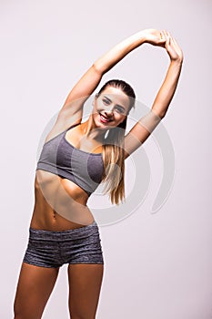 Athlete girl doing plank exercise
