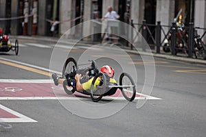 Athlete with its Special Bike on a City Track during a Race