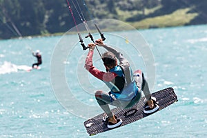 Athlete with kite surfing
