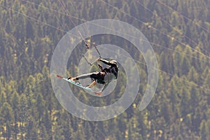 Athlete with kite surfing