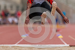 Athlete in long jump during competition