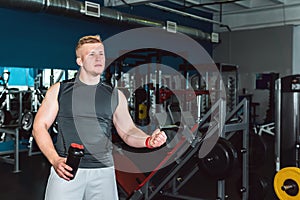 Athlete makes an approving gesture in the gym