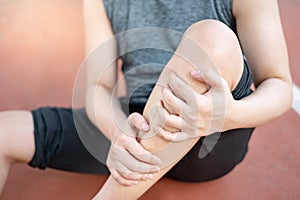 Athlete man suffering from leg and knee pain