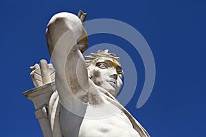 Athlete Marble statue portrait against blue sky