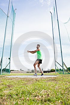 Athlete performing a hammer throw