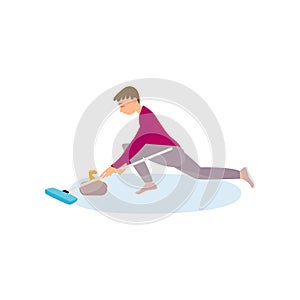 An athlete in red clothes on the ice is rubbing the floor with a brush, thus pushing a stone.