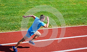 Athlete run track grass background. Runner in motion. Man athlete run training. Many runners like challenge of extending