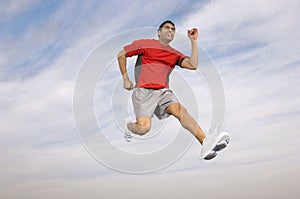 Athlete Running Midair photo