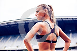 Athlete's attitude, Blonde Fitness Woman on stadium