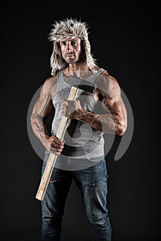 Athlete with sexy torso with sledge hammer. man worker with fit torso. male hold sledge hammer. power and energy concept