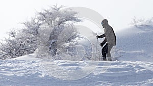 Athlete skiing in the snowy mountains