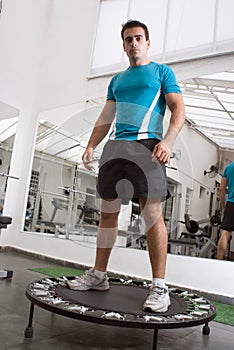 Athlete Standing on Trampoline