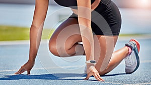 Athlete, starting line and sports track with runner outdoor for fitness, exercise and training for a race, marathon or