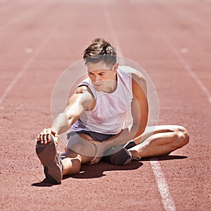 Athlete, stretching and man outdoor for exercise, running or workout at sports stadium. Male runner or sport person on