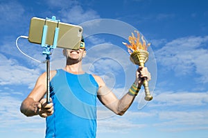 Athlete Taking Selfie with Sport Torch