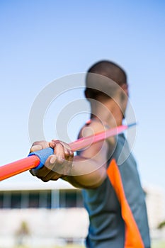 Athlete about to throw a javelin