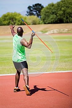 Athlete about to throw a javelin