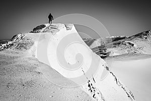 Athlete on top mountain