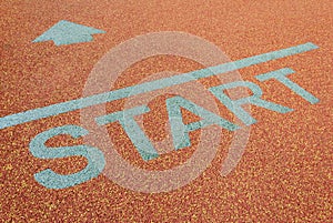 Athlete track start sign with arrow
