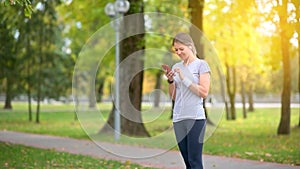 Athlete is training in the park at dawn