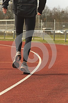 Athlete warming up on a race track