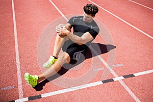 Athlete warming up on the running track