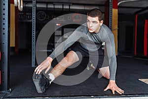 Athlete warming up before a workout at the gym, boxer training