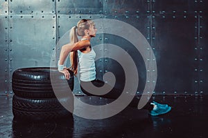 Athlete woman doing push-ups on bench training