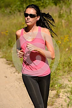 Athlete woman running training on sunny day