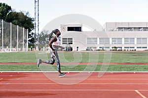 Athlete woman sprinter running in track