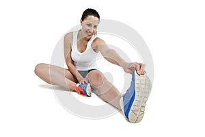 Athlete woman stretching her hamstring