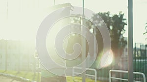 Athlete woman waiting in the starting block on running track 4k