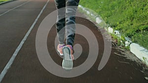 Athlete woman waiting in the starting block on running track 4k