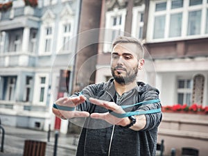 Athlete workout with streching tape photo