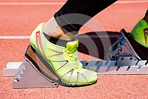 Athletes hands on a starting block