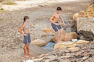 Athletes performs freerunning jump on stones