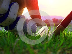 Athletes placed golf balls down in the field