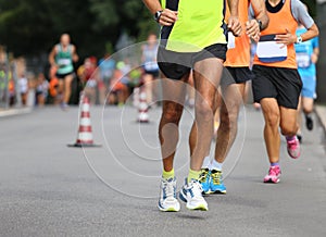 Athletes run the marathon on the city road