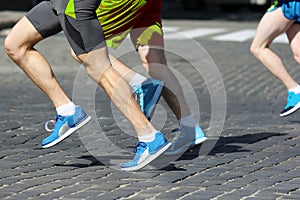 Athletes run marathons on the pavement. sport and health