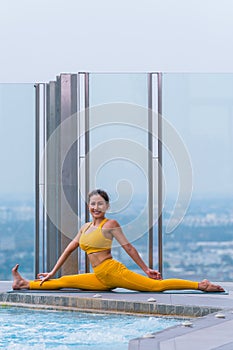Woman pratice yoga workout training pose show body flexibilty and balance photo