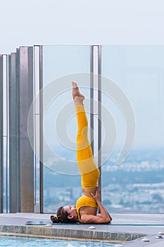 Woman pratice yoga workout training pose show body flexibilty and balance photo