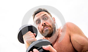 Athletic body. Dumbbell gym. Muscular man exercising with barbell. fitness health diet. sport. Perfect six pack. scary